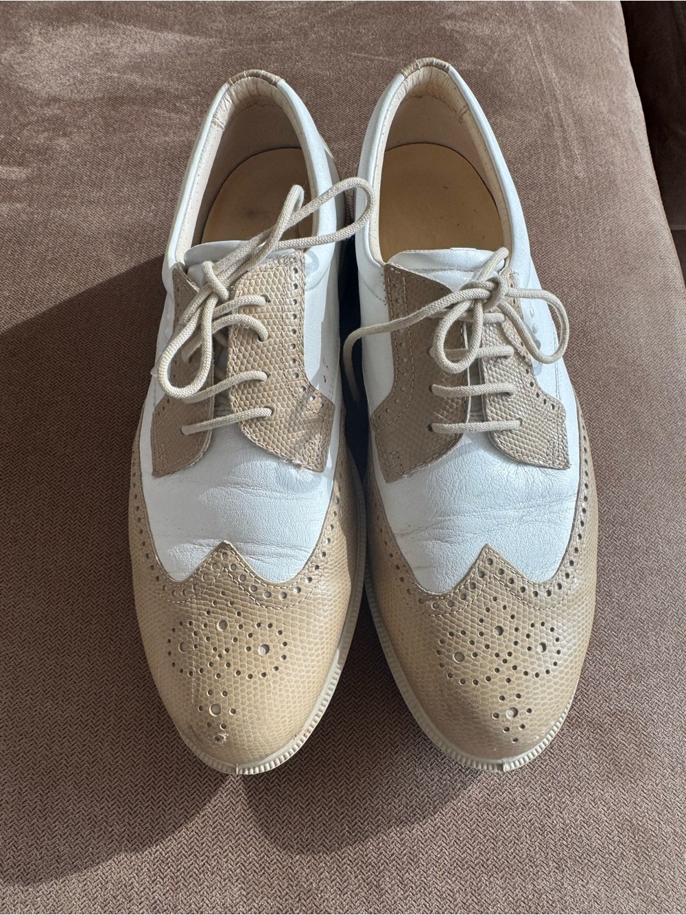 Women’s Ecco beige and white golf shoes, size 39.